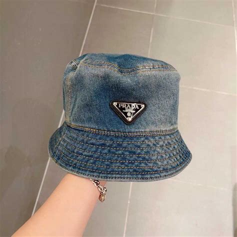 prada denim hat.